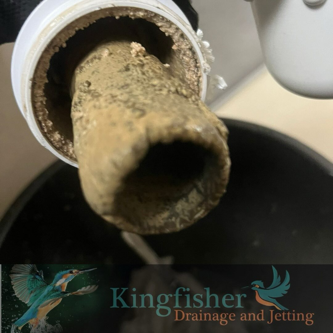 Blocked drain pipe with thick sludge